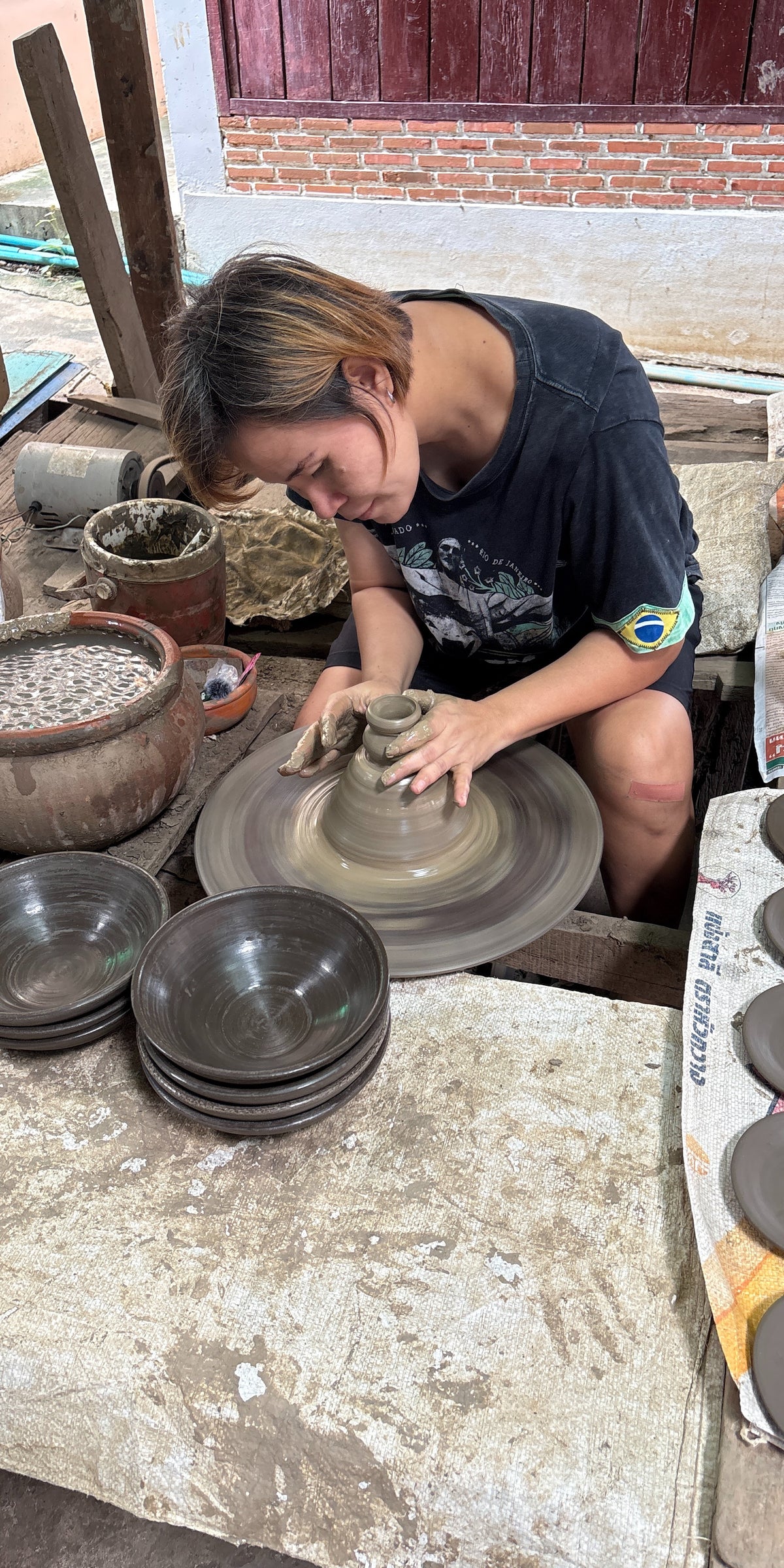 Max shaping the clay
