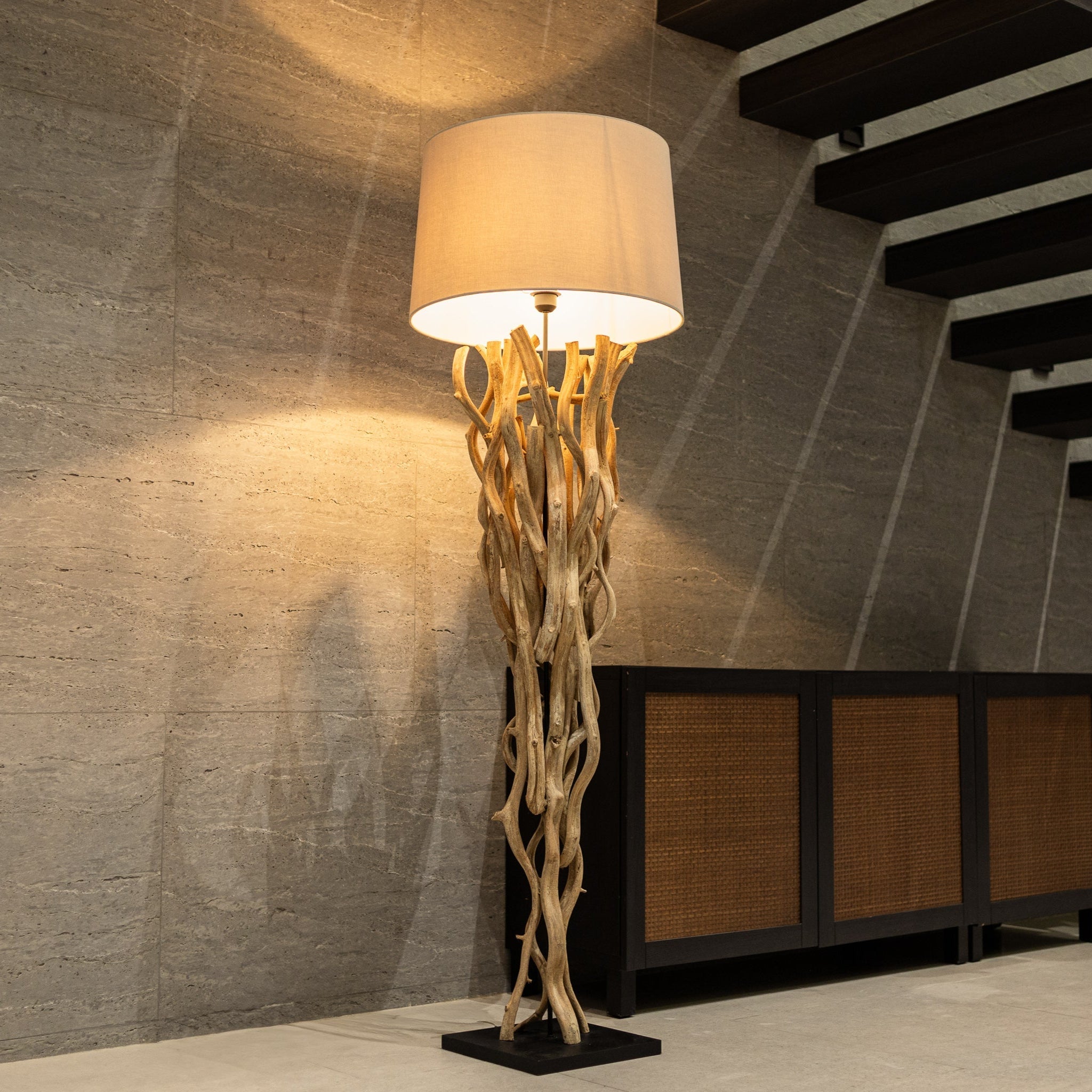 Floralia floor lamp made from intertwined lianas vines with linen shade, handcrafted natural lighting accent in modern interior by Willow Tree Decor